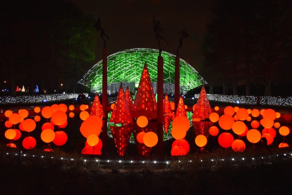 Garden Glow St Louis 2021 lit up with red and green lights. 