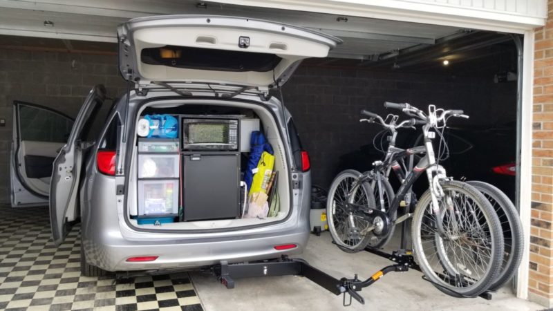 Minivan turned campervan, getting ready to road trip.