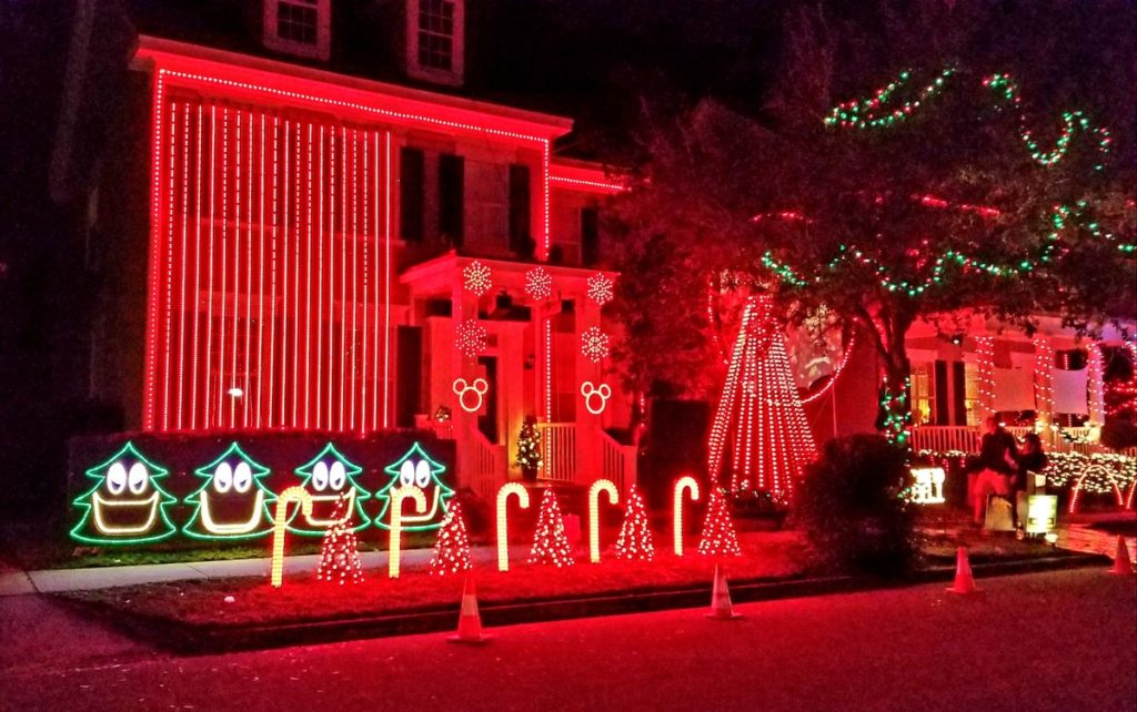 Red and green Christmas lights on Jeater Bend, a street in Celebration.