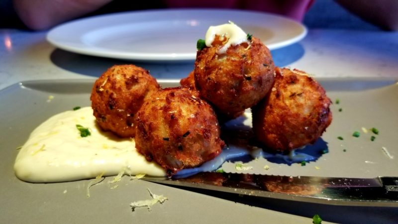 Crab croquettes with pommes puree, lemon, chive, and citrus aioli at 8Eleven Modern Bistro.