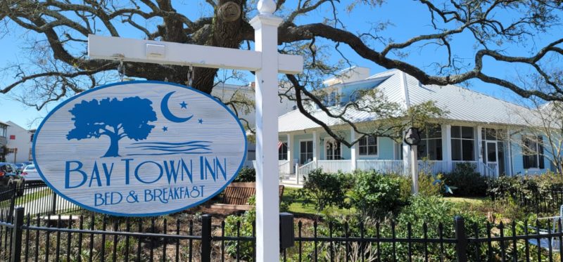 The Bay Town Inn Bed and Breakfast sign and office.