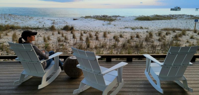 Outdoor terrrace at sunset at The Lodge in Gulf Shores, Alabama.