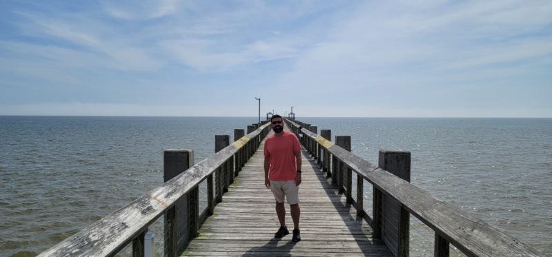 Beach Park Pier jutting out into the Gulf of Mexico.