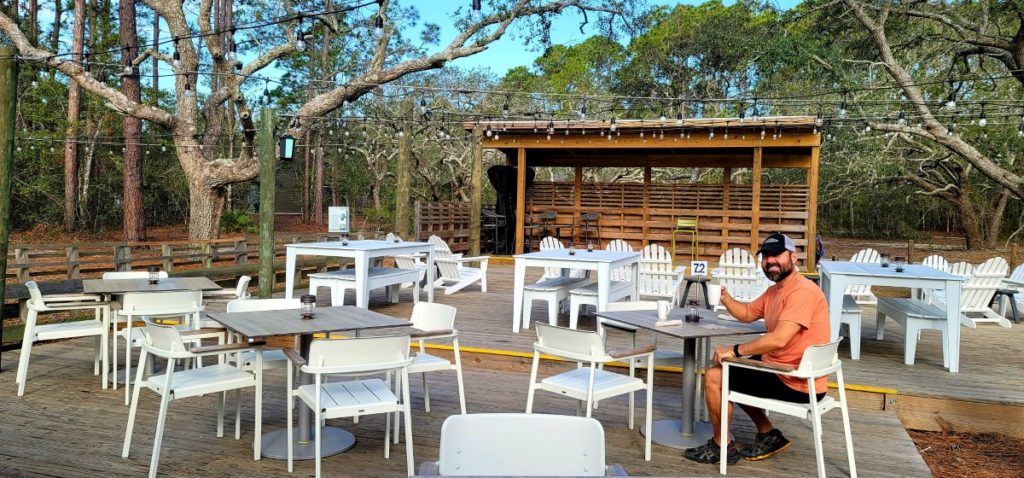 The outdoor patio at the Woodside Restaurant inside Gulf State Park is