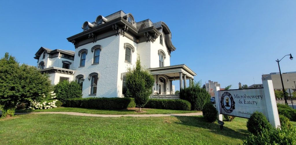 The front of the historic mansion that houses Obed and Isaacs Microbrewery and Eatery.