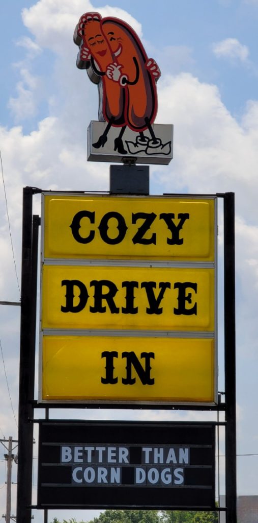 The yellow Cozy Drive In sign outside one of the most popular Route 66 attractions in Springfield, IL.