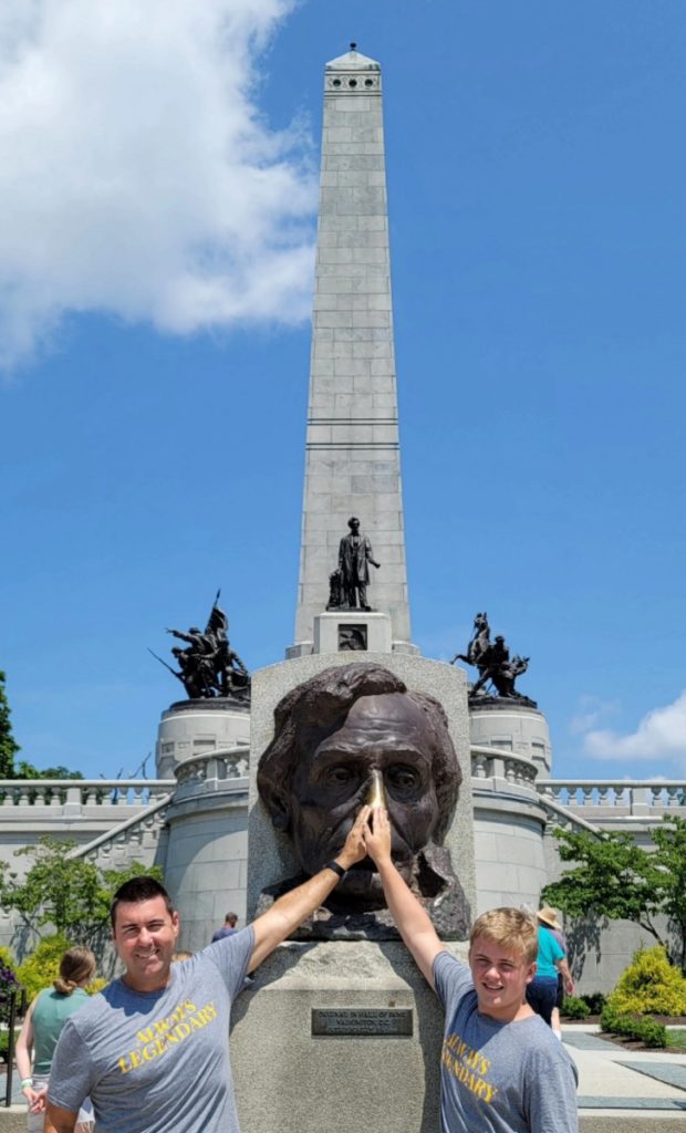 Rubbing Abraham Lincoln's nose at the Lincoln Tomb Historic Site.