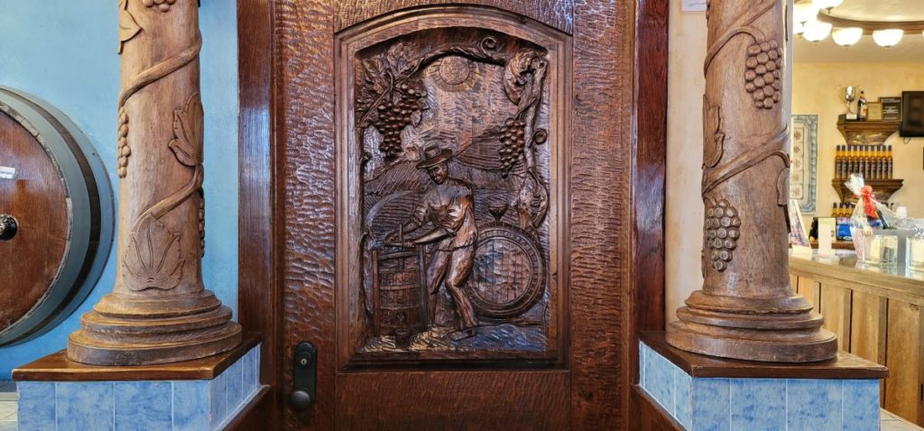 Hand-carved wooden doors at a winery on the Shawnee Hills Wine Trail.