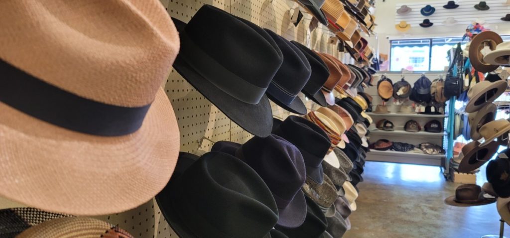 An entire wall of men's hats at Hatman Jack's in Wichita things to do.