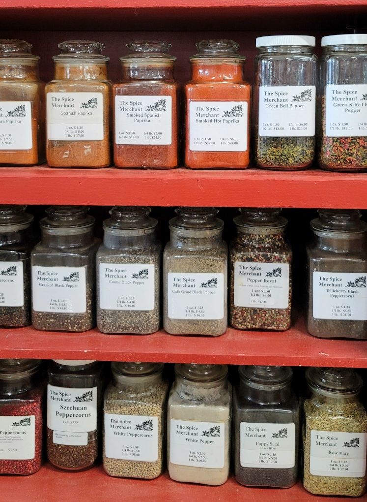 A cabinet of spices at The Spice Merchant - Shopping is one of the fun things to do in Wichita Kansas.