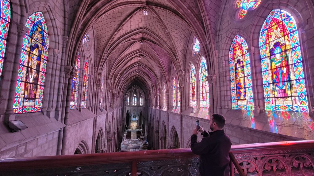 The stained glass windows inside the Basilica of the National Vow, the tower tour is one of the unique things to do in Quito.