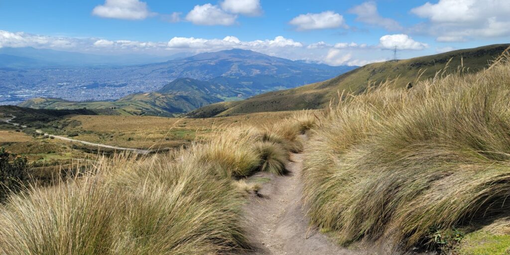Ecuador hiking trail overlooking mountains.