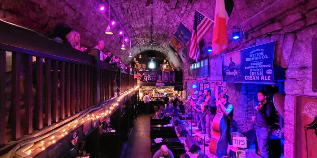 An underground Irish bar in Weston, Missouri with a band playing.