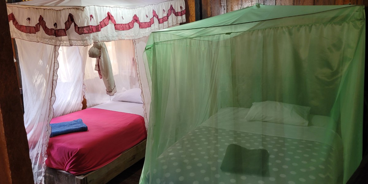 The netted beds at the Dolphin Lodge, one of Ecuador Amazon lodges.