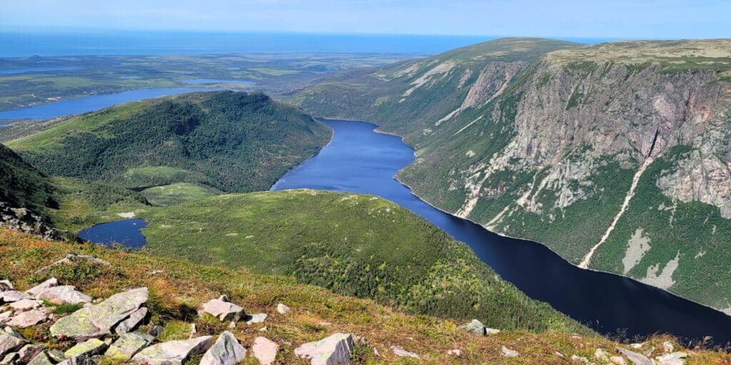 Panoramic view from the summit overlooking Ten Mile Pond Gorge.