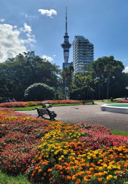 The Victorian Fountain area of Albert Park with a large garden of flowers.